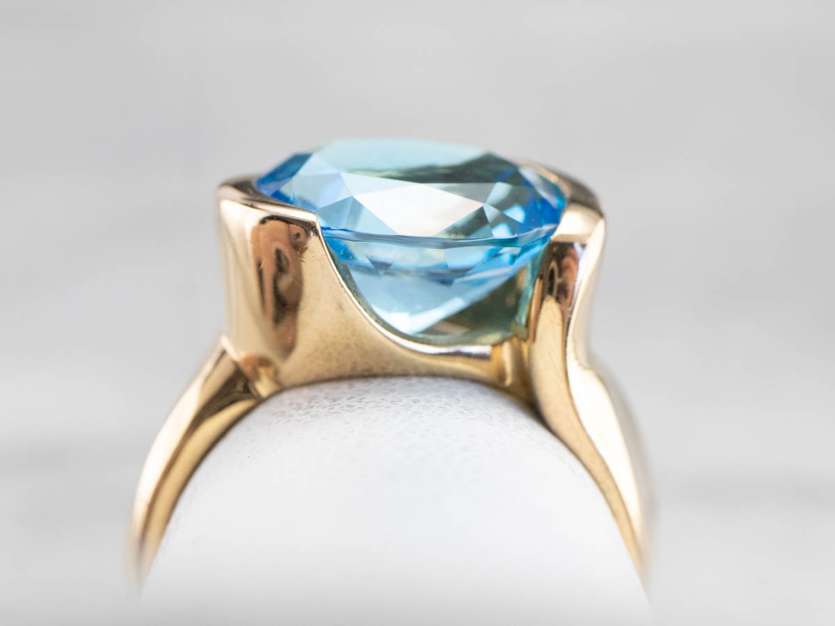 East to West Blue Topaz Modernist Gold Ring