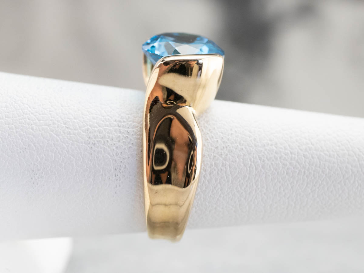East to West Blue Topaz Modernist Gold Ring