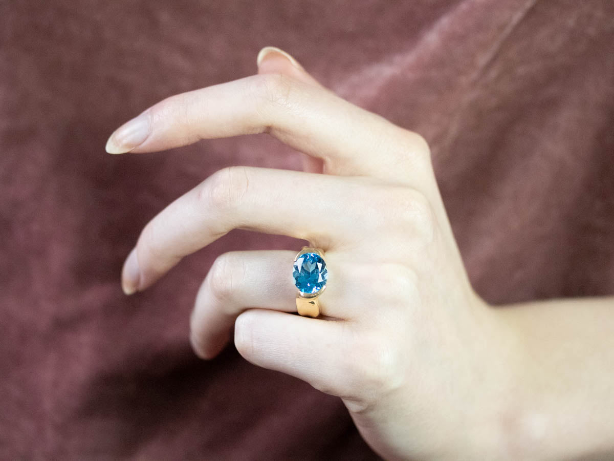 East to West Blue Topaz Modernist Gold Ring