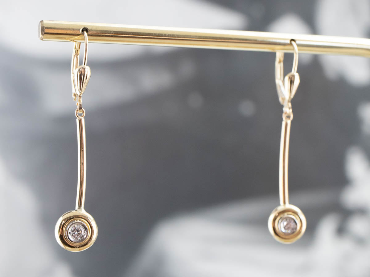 Pendientes colgantes minimalistas con barra de oro y diamantes