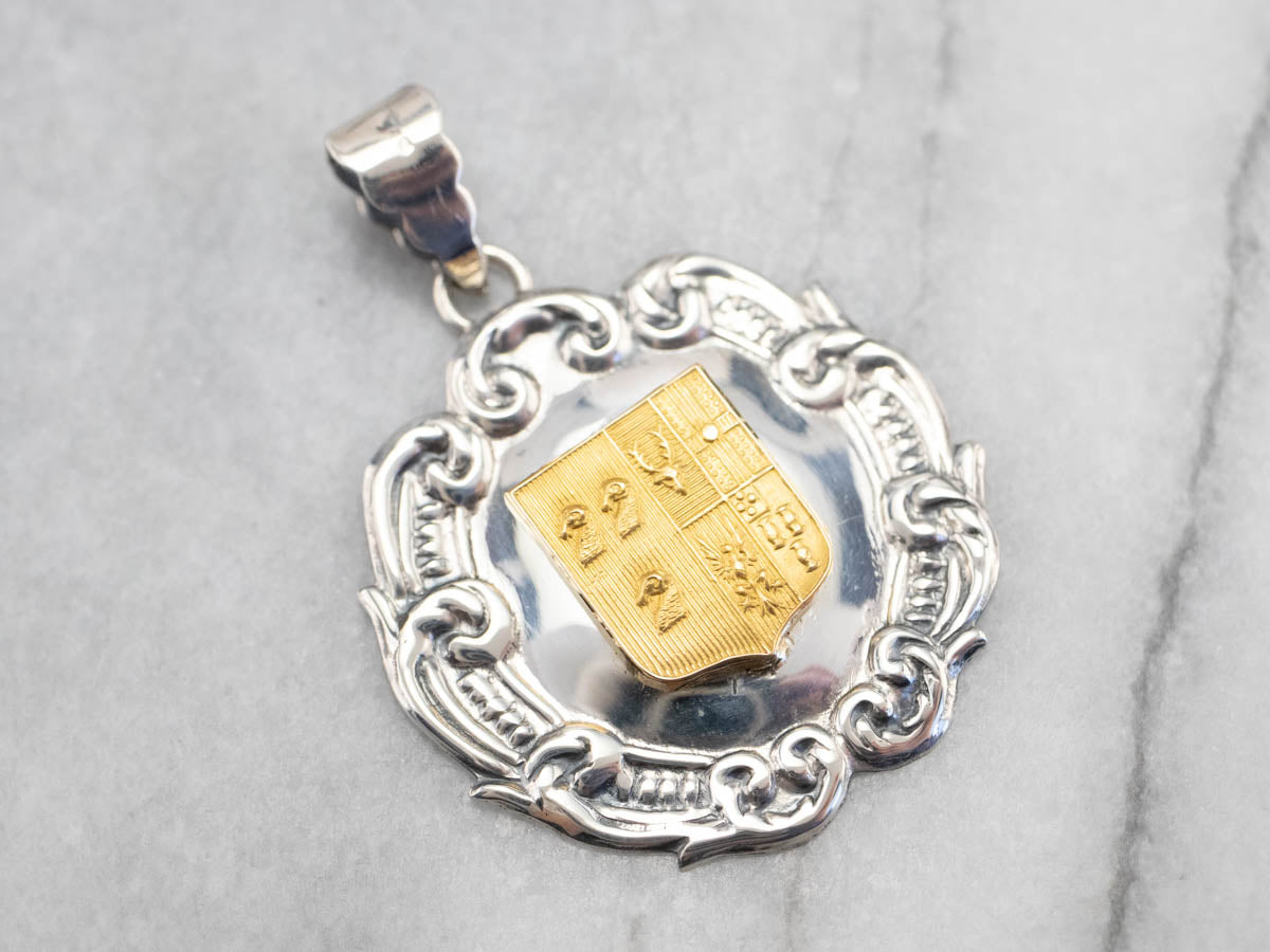 Silver and Yellow Gold Crest Pendant