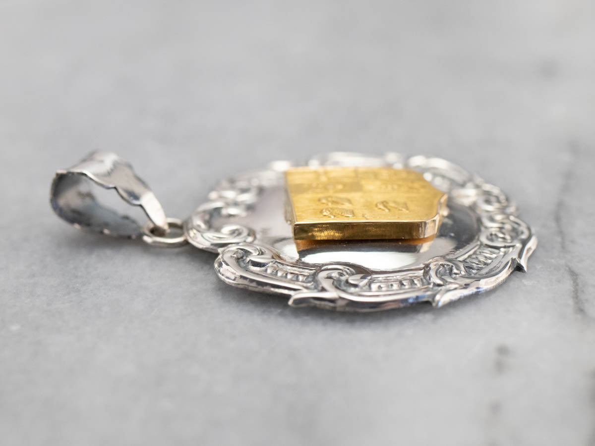 Silver and Yellow Gold Crest Pendant