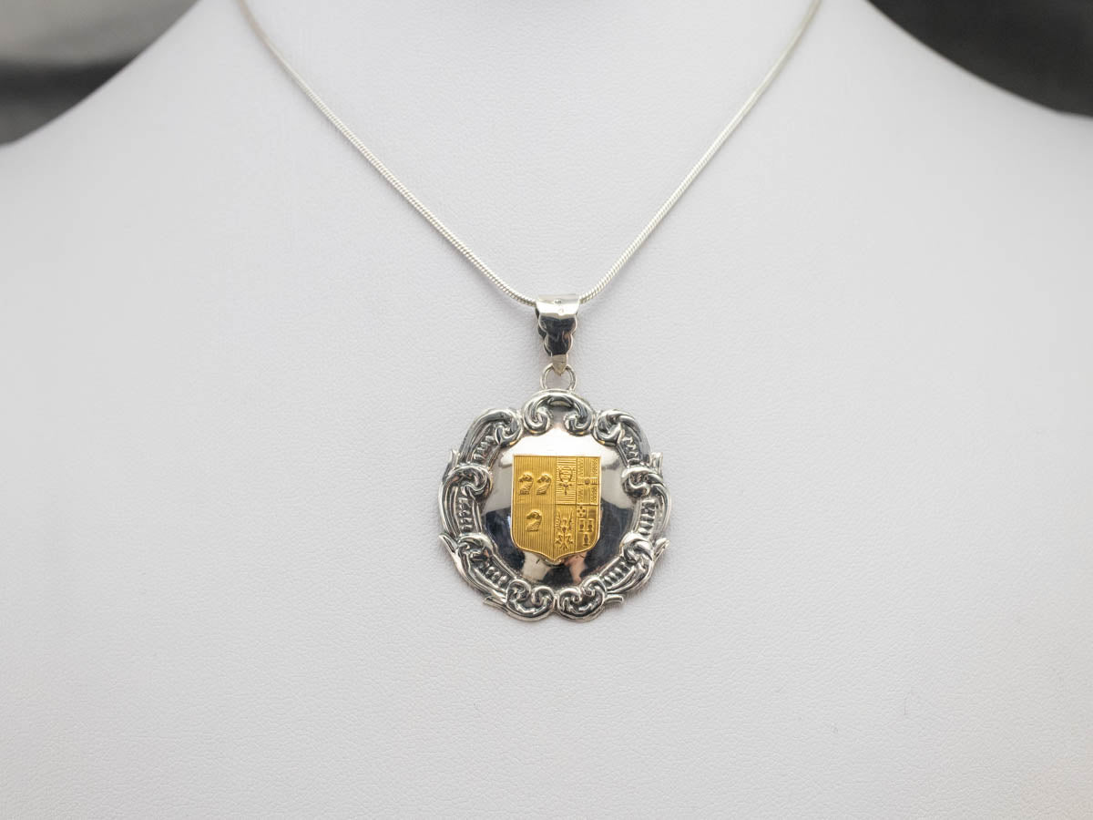 Silver and Yellow Gold Crest Pendant