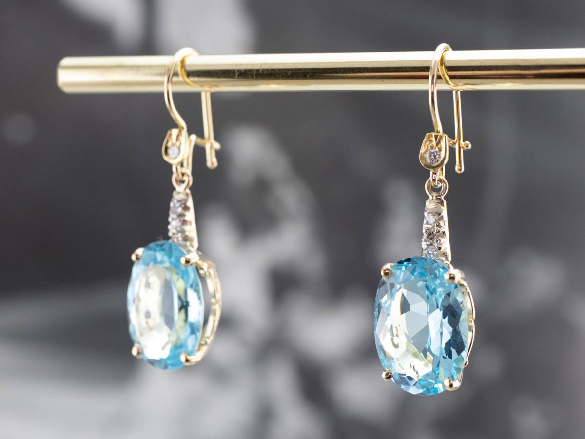Pendientes colgantes de diamantes y topacios azules dorados