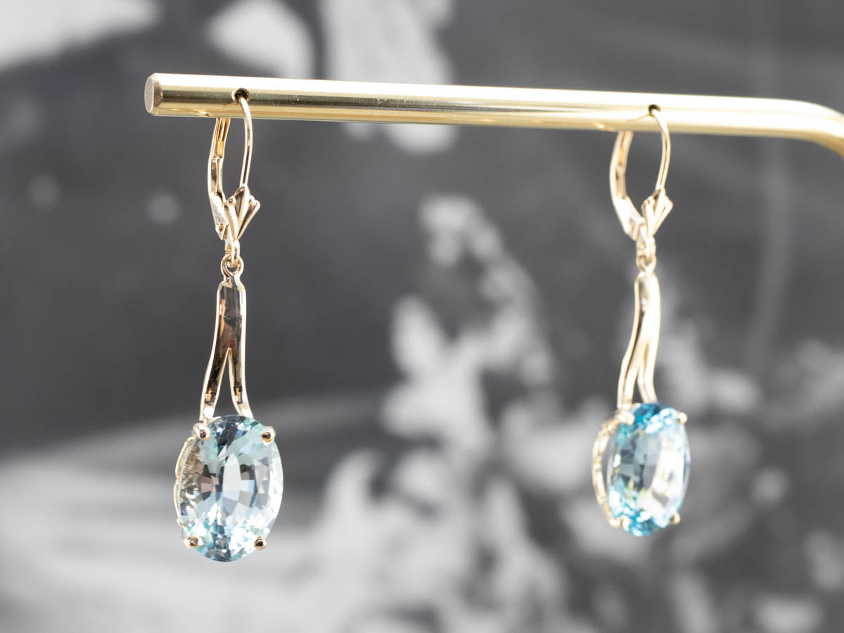 Pendientes colgantes de piedras preciosas de topacio azul