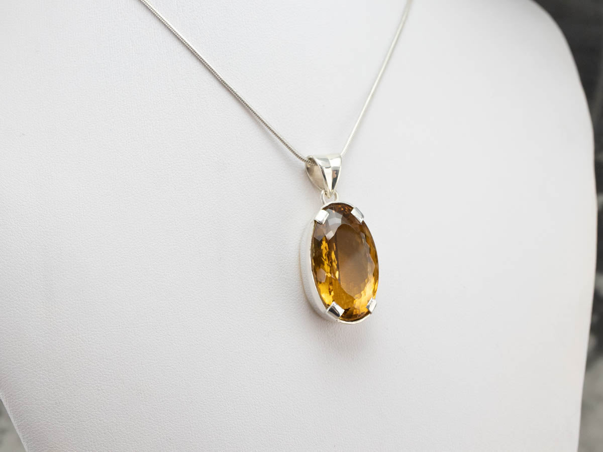 Colgante llamativo de plata de ley con cuarzo miel