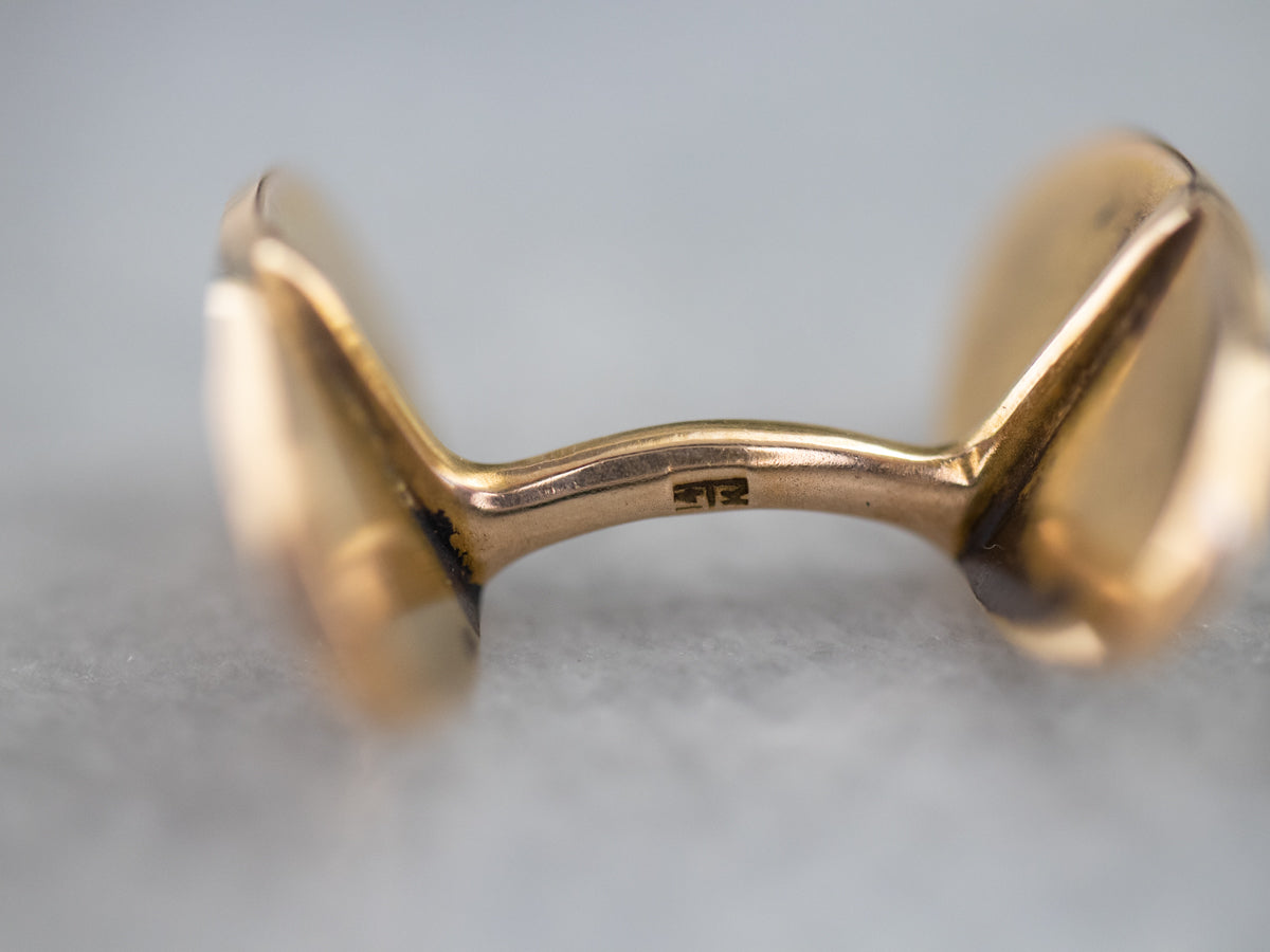 Gemelos dorados con águila de la época victoriana