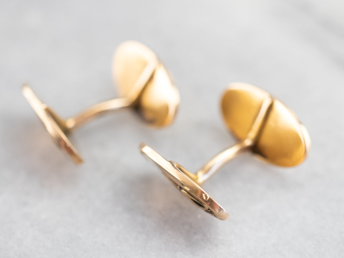 Gemelos dorados con águila de la época victoriana