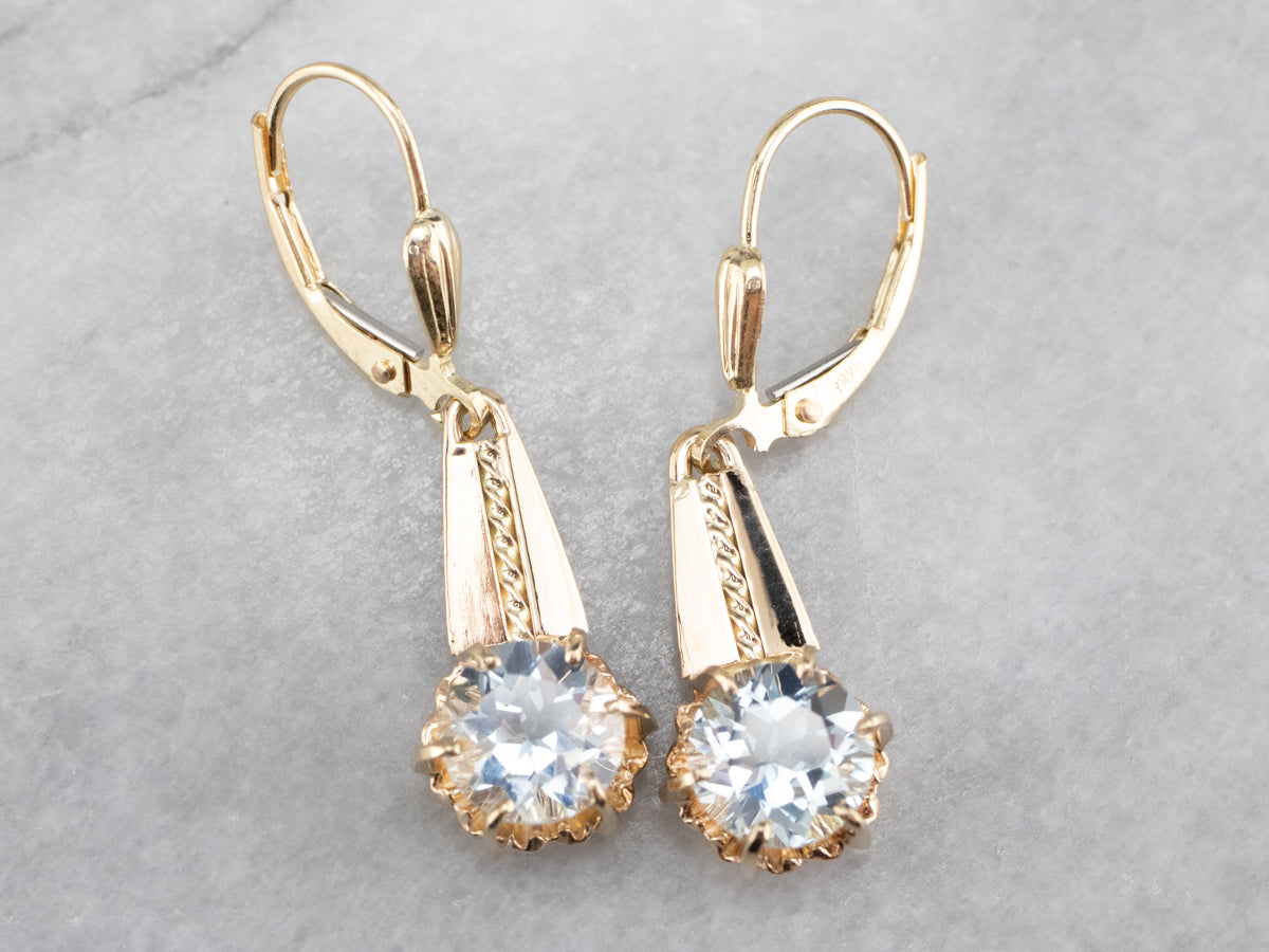 Pendientes colgantes de oro y aguamarina azul claro