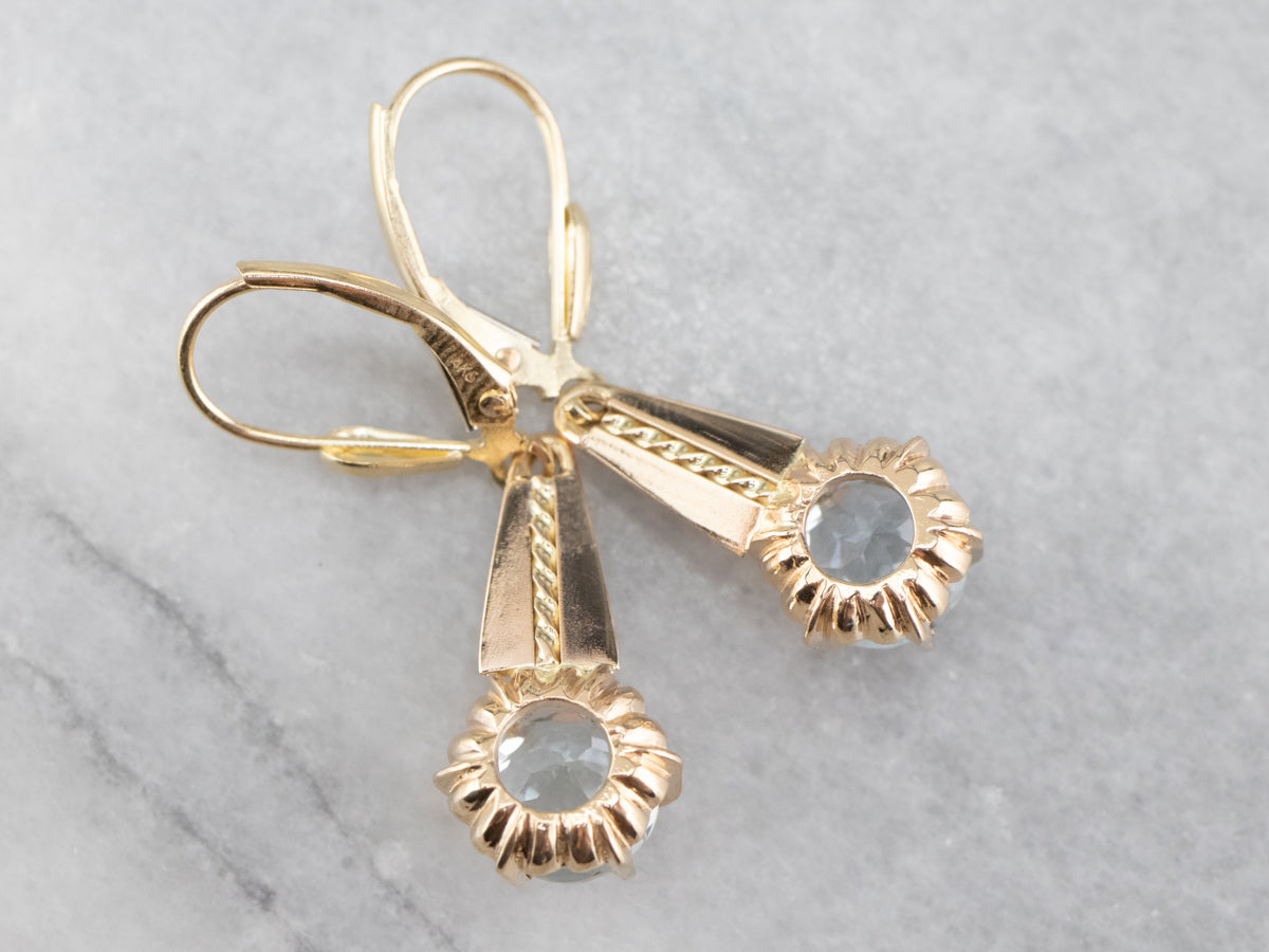 Pendientes colgantes de oro y aguamarina azul claro