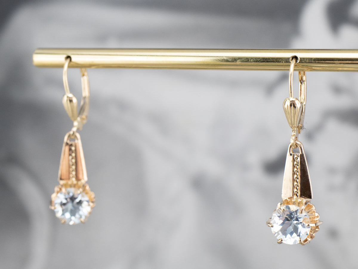 Pendientes colgantes de oro y aguamarina azul claro