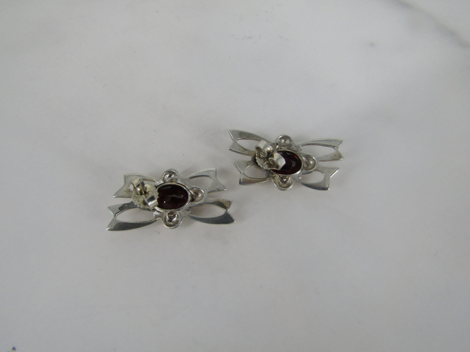 Gold Plated Openwork Studs with Garnet Center Stone