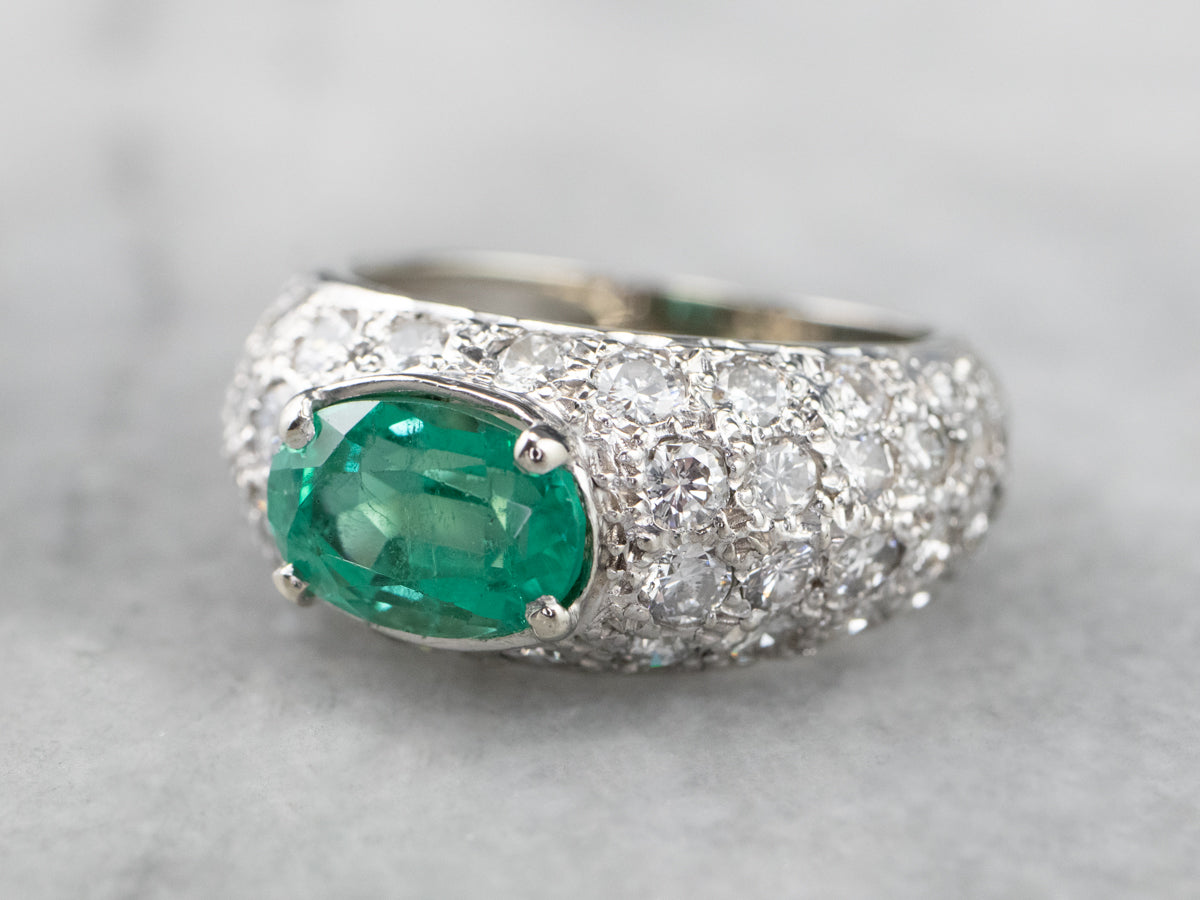Modern Gold Emerald and Diamond Engagement Ring