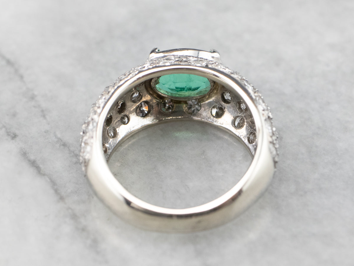 Modern Gold Emerald and Diamond Engagement Ring