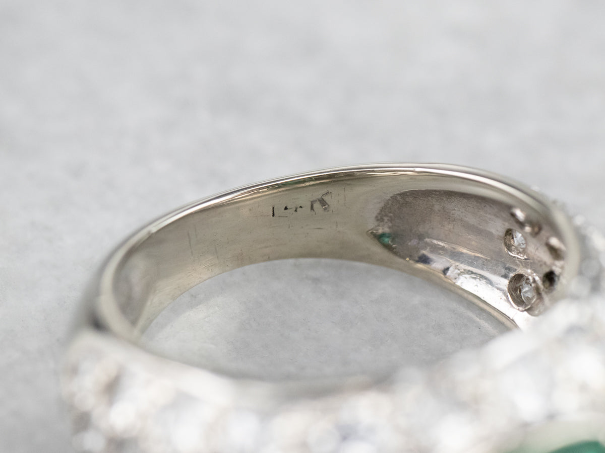 Modern Gold Emerald and Diamond Engagement Ring