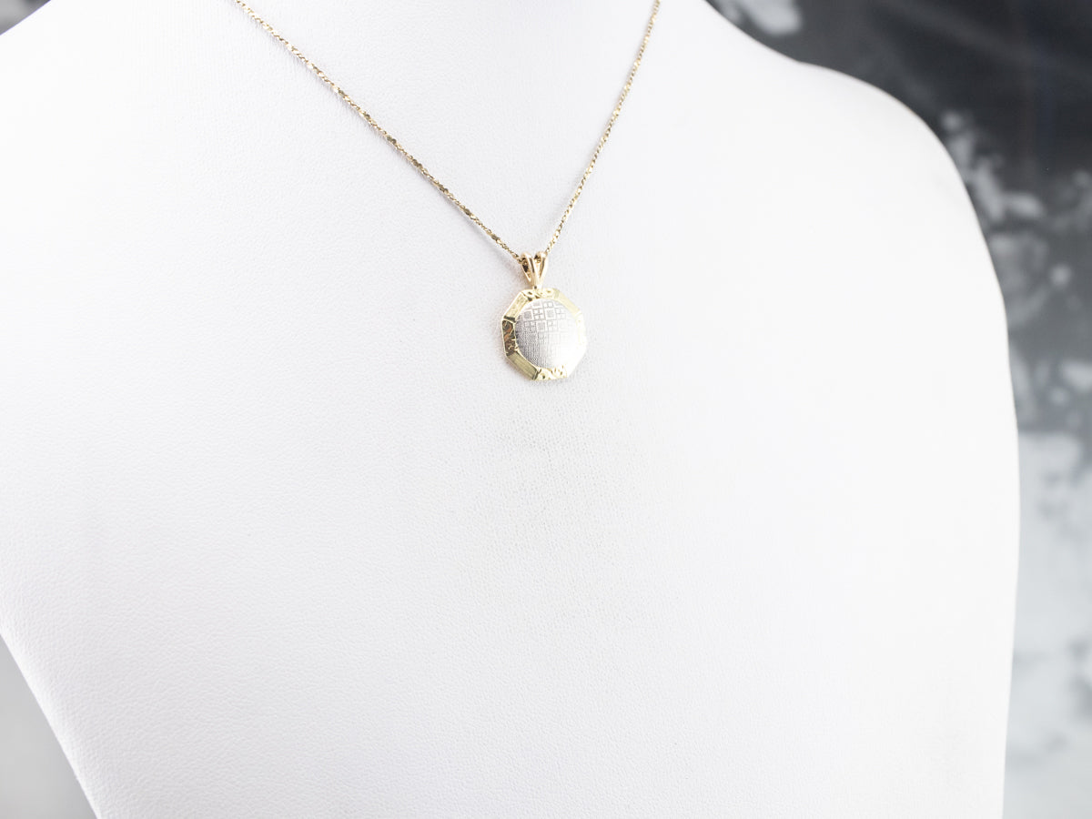 Platinum and Gold Textured Metal Pendant