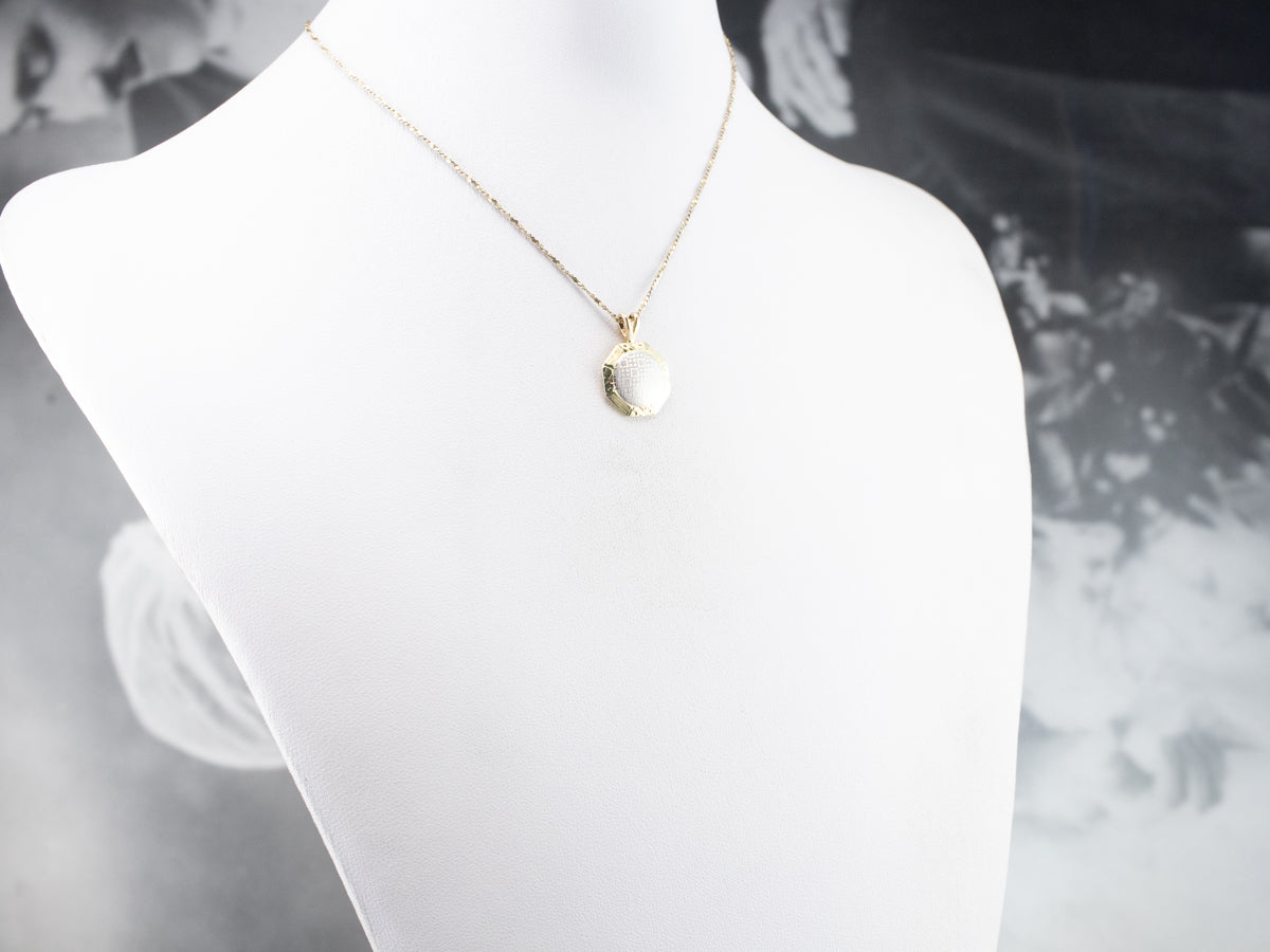 Platinum and Gold Textured Metal Pendant