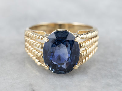 Sapphire Gold Solitaire Ring with Rope Accents