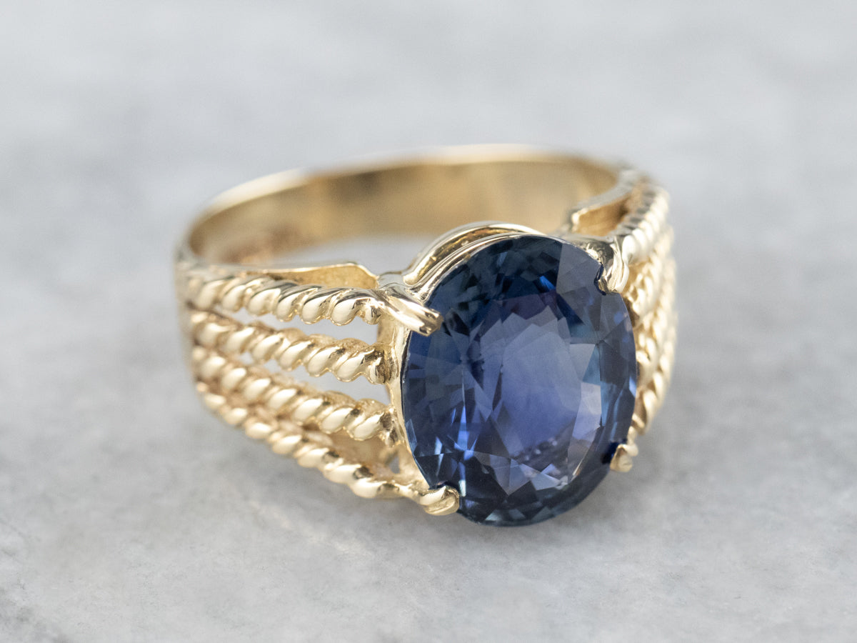 Sapphire Gold Solitaire Ring with Rope Accents