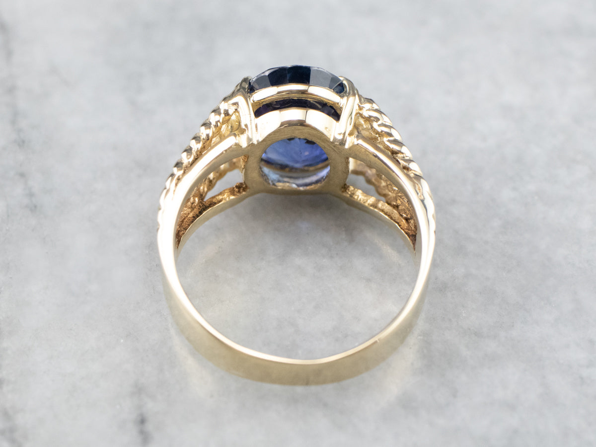 Sapphire Gold Solitaire Ring with Rope Accents
