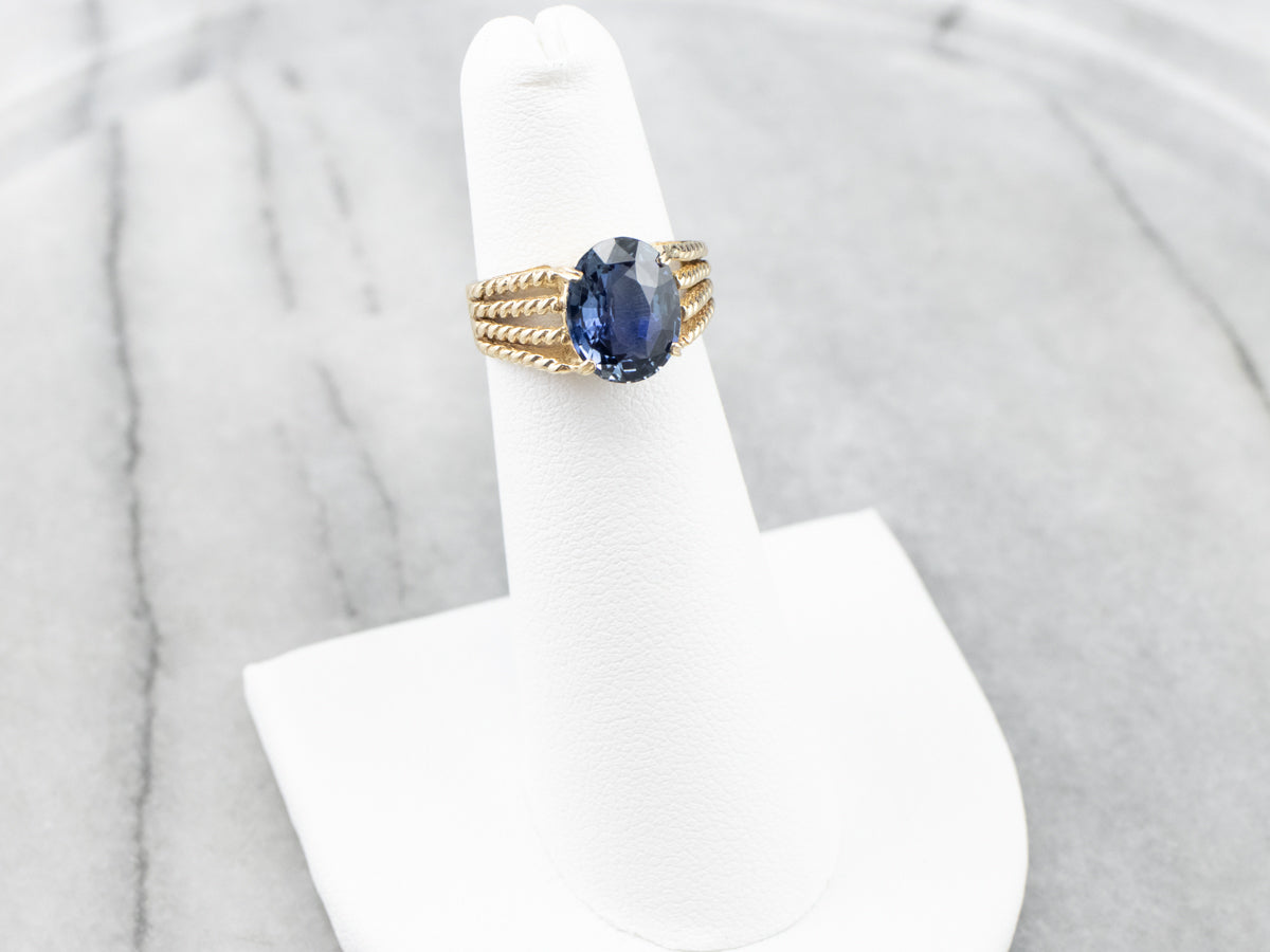 Sapphire Gold Solitaire Ring with Rope Accents