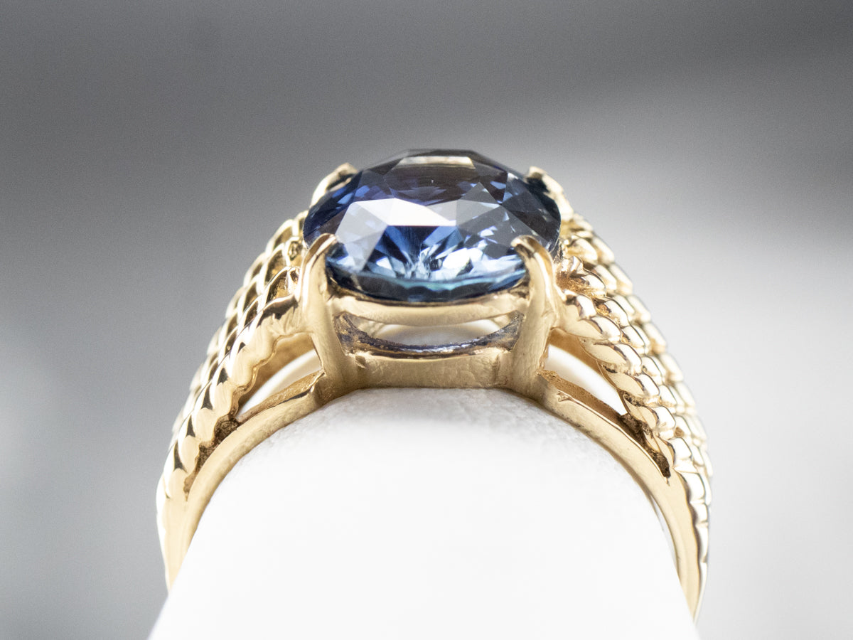Sapphire Gold Solitaire Ring with Rope Accents