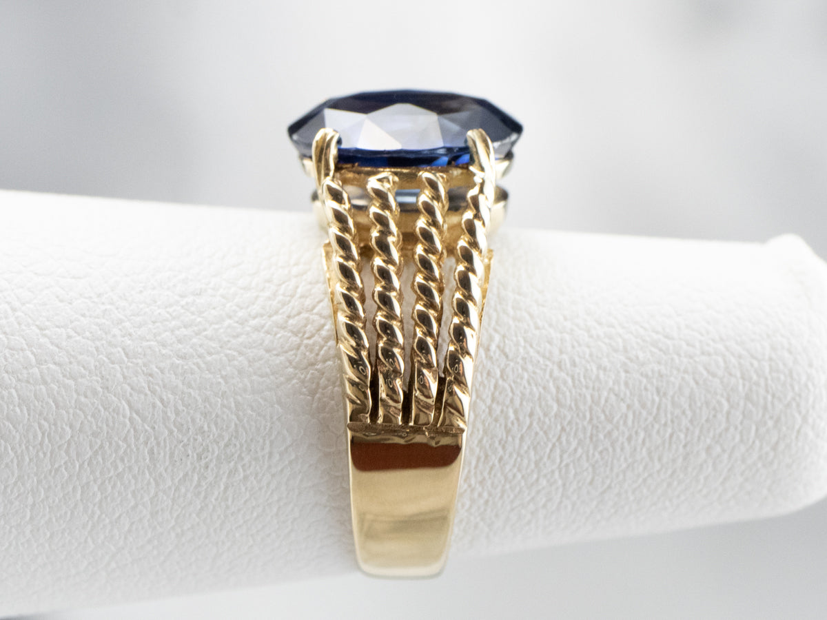 Sapphire Gold Solitaire Ring with Rope Accents
