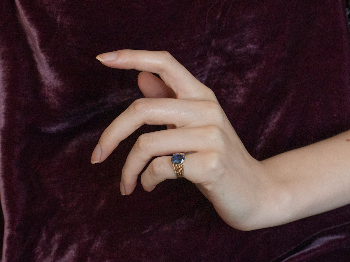 Sapphire Gold Solitaire Ring with Rope Accents