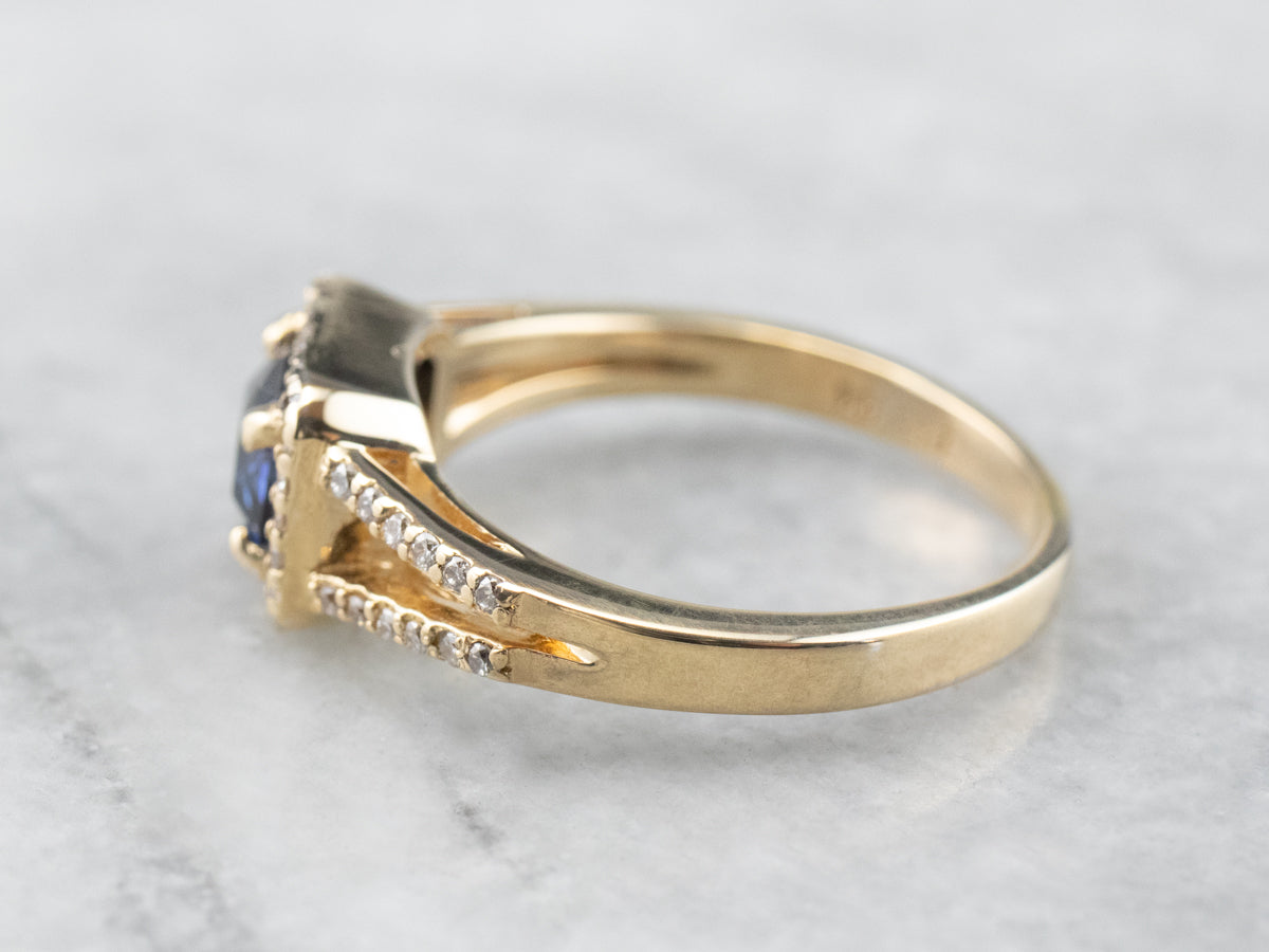 Gold Sapphire and Diamond Halo Ring