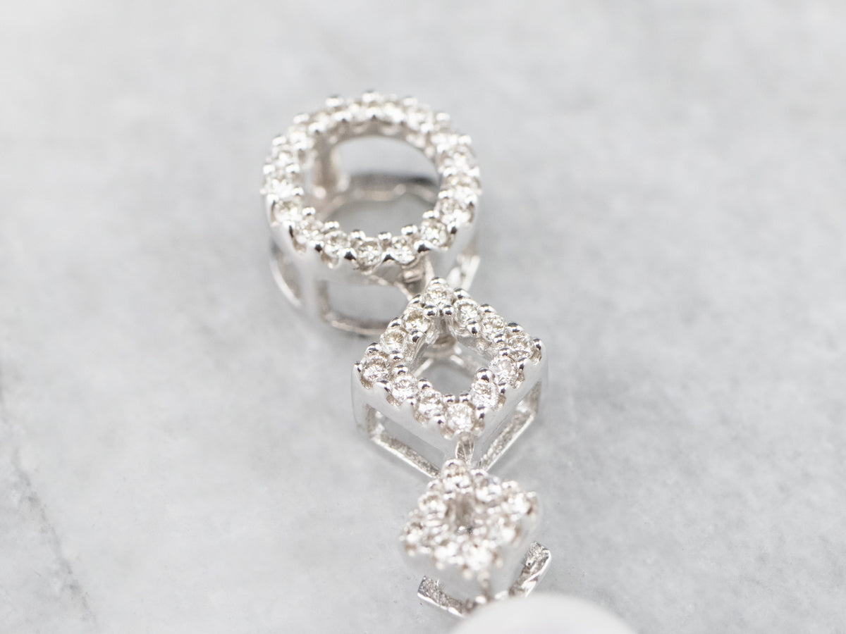 Colgante de oro blanco con diamantes y perlas geométricas