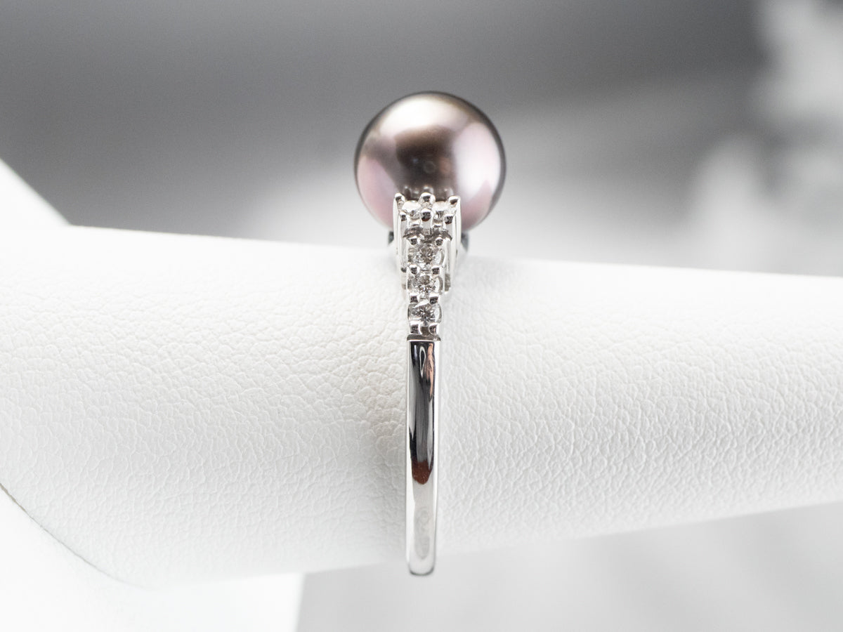 Anillo de perlas negras y diamantes