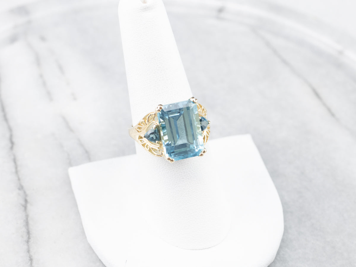 Three Stone Blue Topaz Gold Cocktail Ring