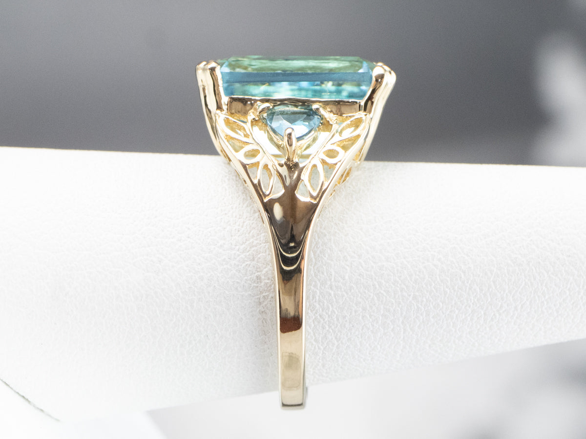 Three Stone Blue Topaz Gold Cocktail Ring