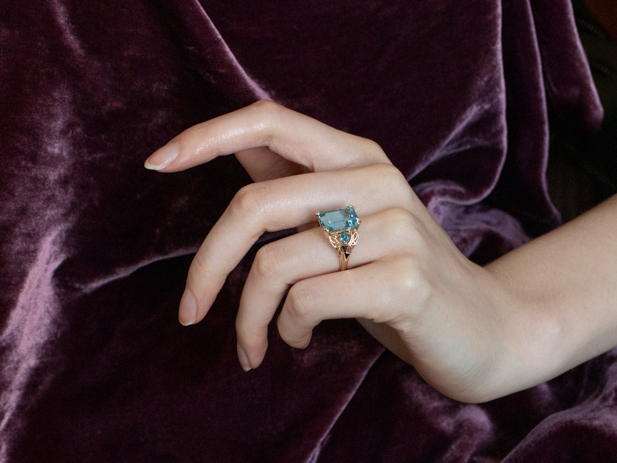 Three Stone Blue Topaz Gold Cocktail Ring