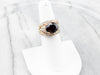 Garnet and Diamond Two Tone Gold Ring