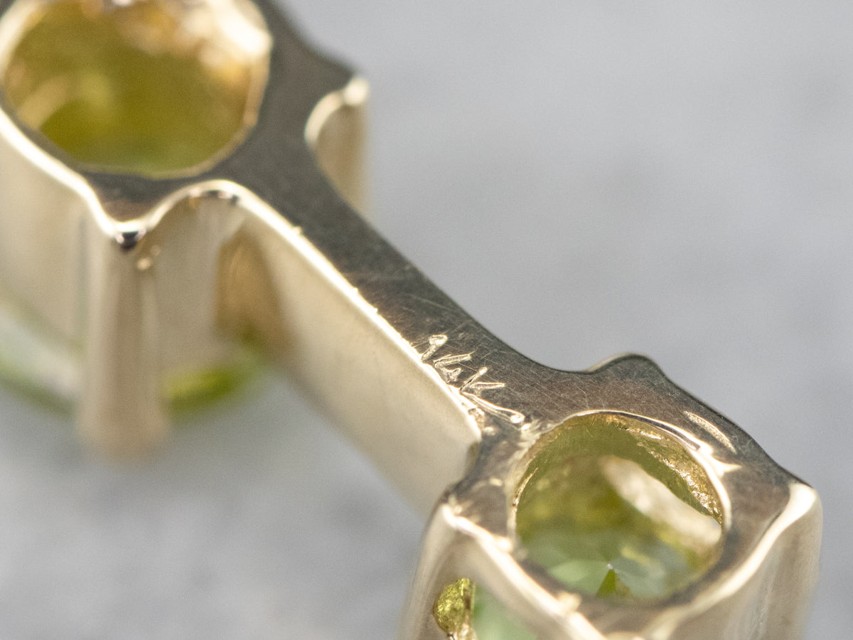 Graduated Three Stone Peridot Gold Pendant