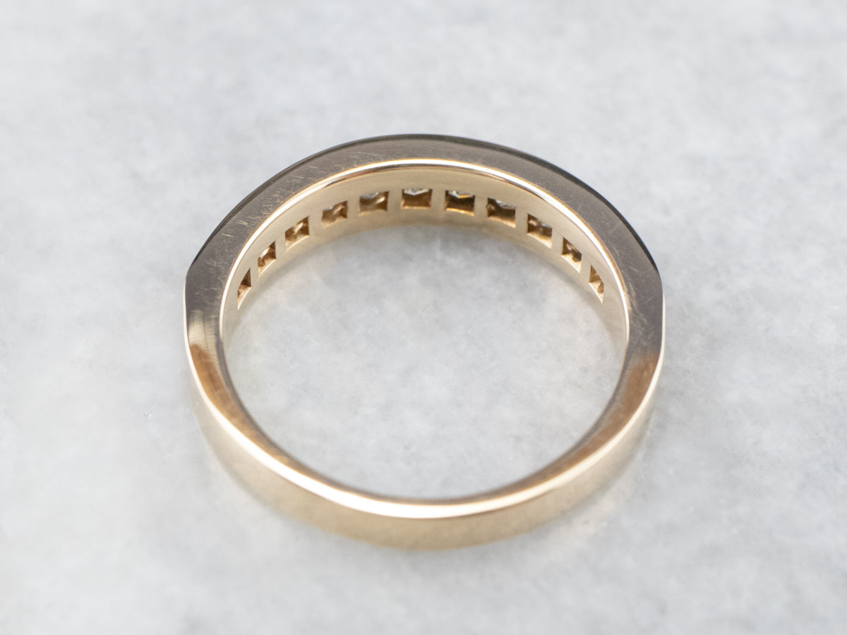 Banda de diamantes de talla princesa con juego de canales