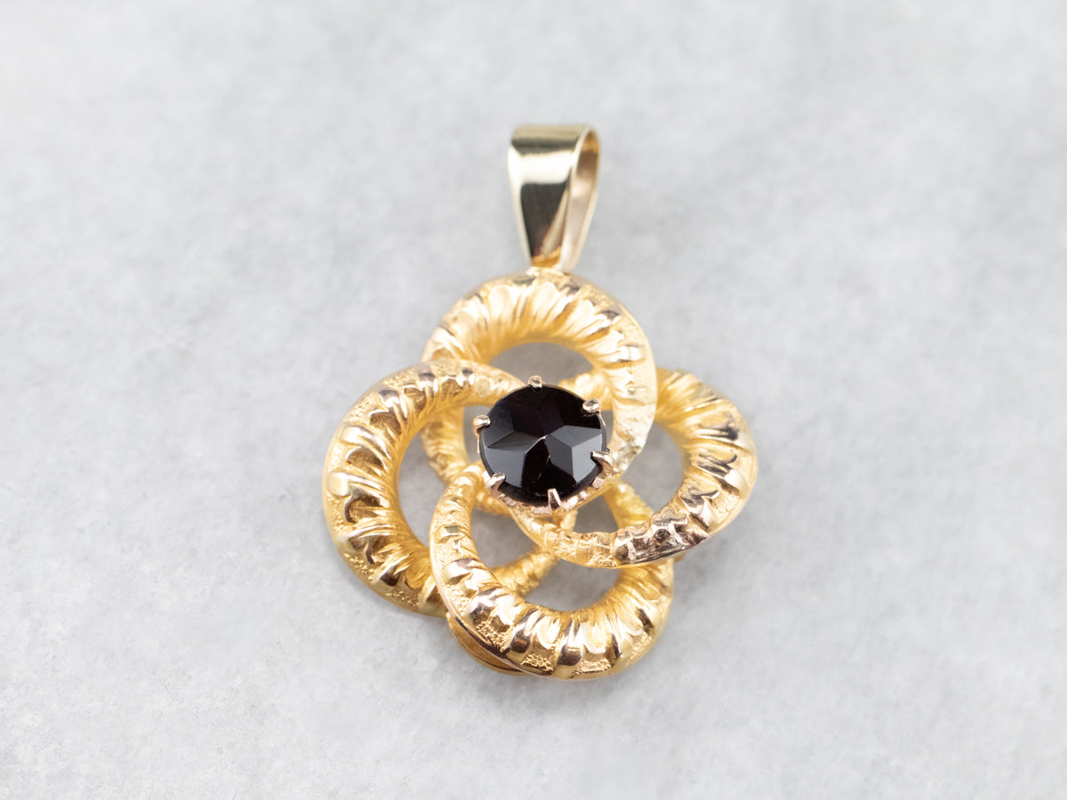 Colgante Nudo Amantes Oro y Granate Piropo