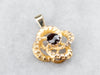 Gold and Pyrope Garnet Lovers Knot Pendant
