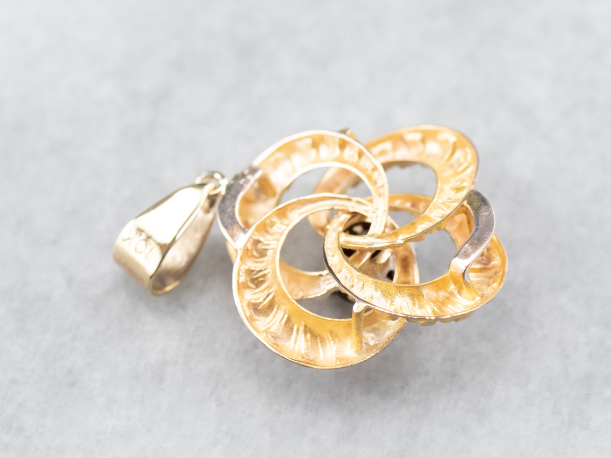 Colgante Nudo Amantes Oro y Granate Piropo