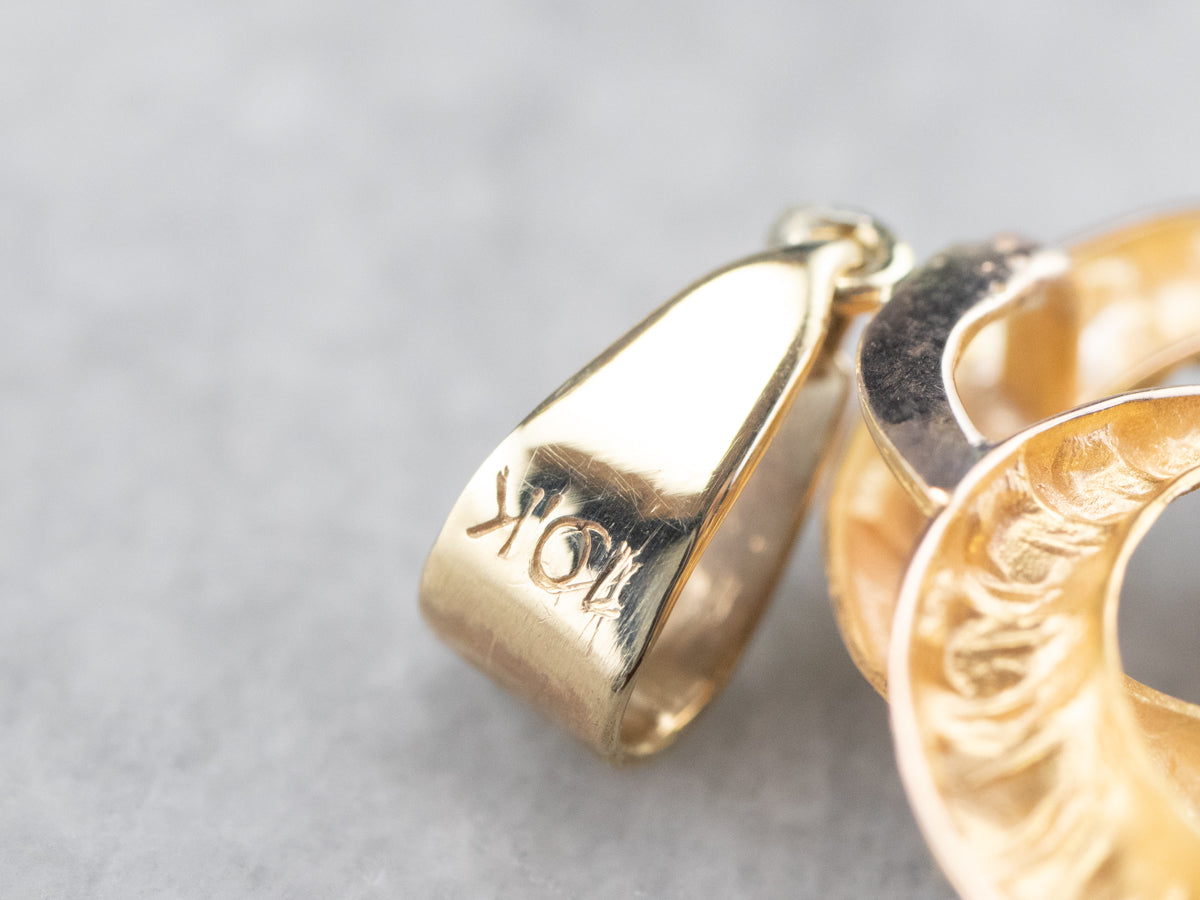 Colgante Nudo Amantes Oro y Granate Piropo