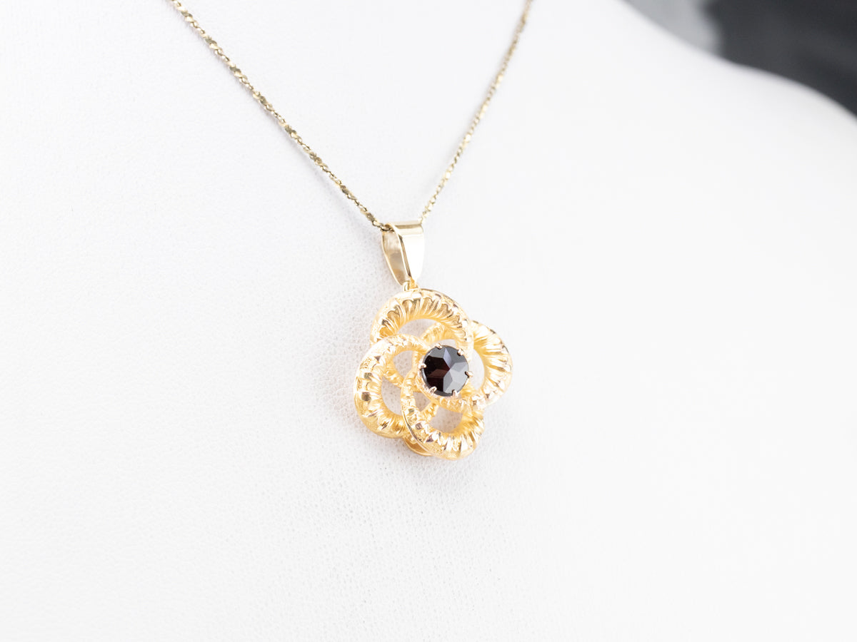 Colgante Nudo Amantes Oro y Granate Piropo