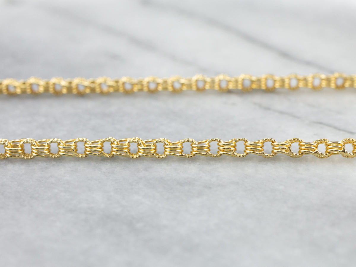 Long 18K Yellow Gold Rolo Chain