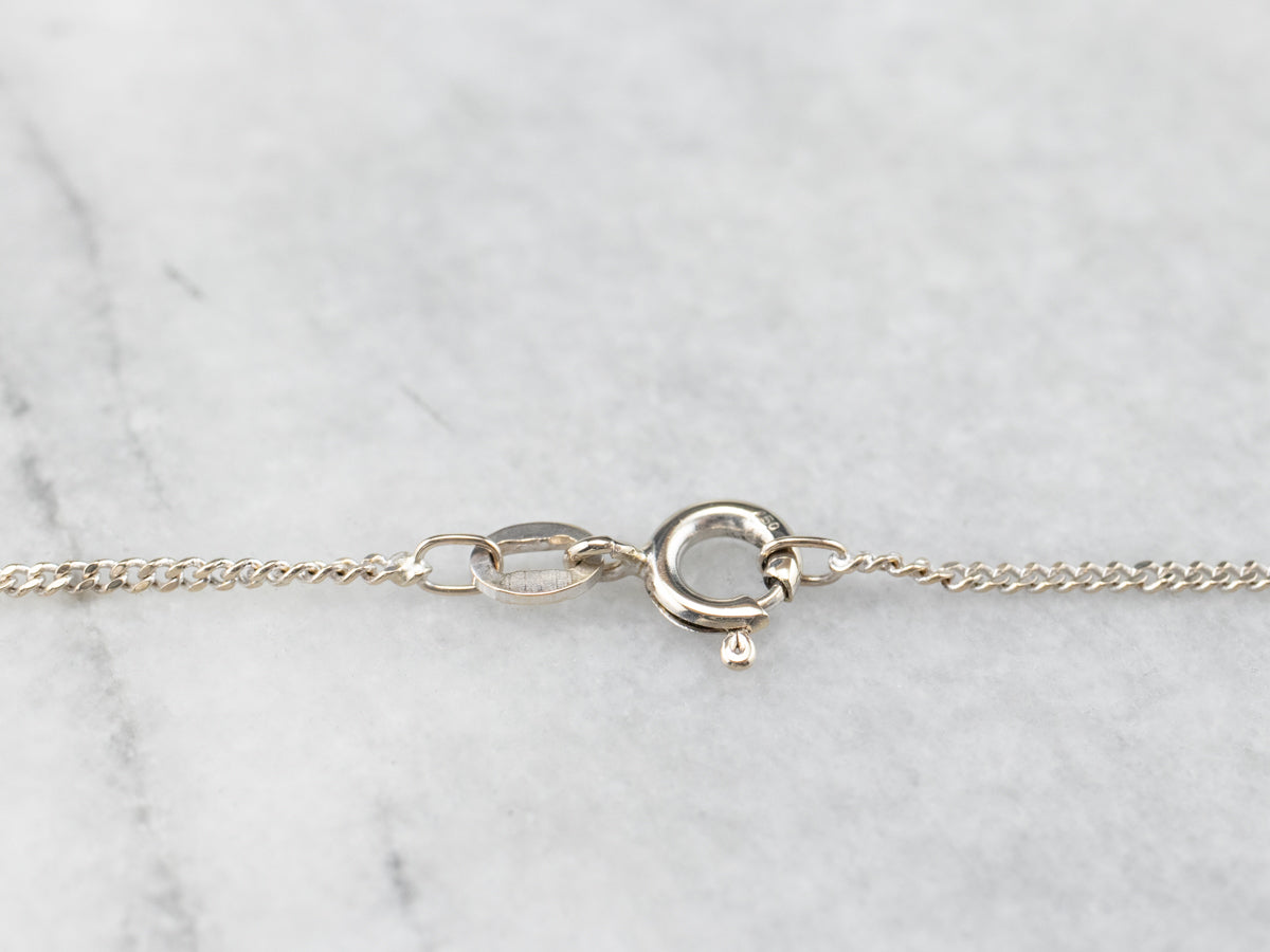 Cadena de oro blanco de 18 quilates.