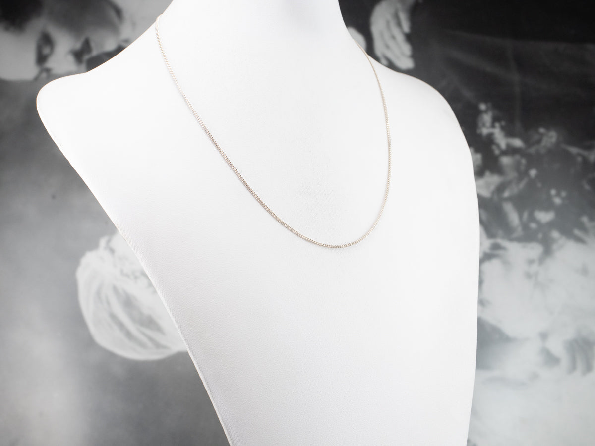 Cadena de oro blanco de 18 quilates.