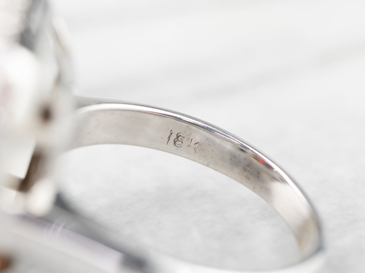 Pyrope Garnet and Diamond Halo Cocktail Ring