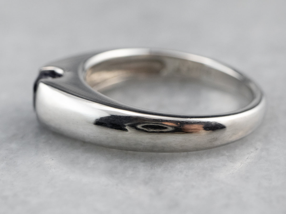 Modern Platinum Sapphire Solitaire Engagement Ring