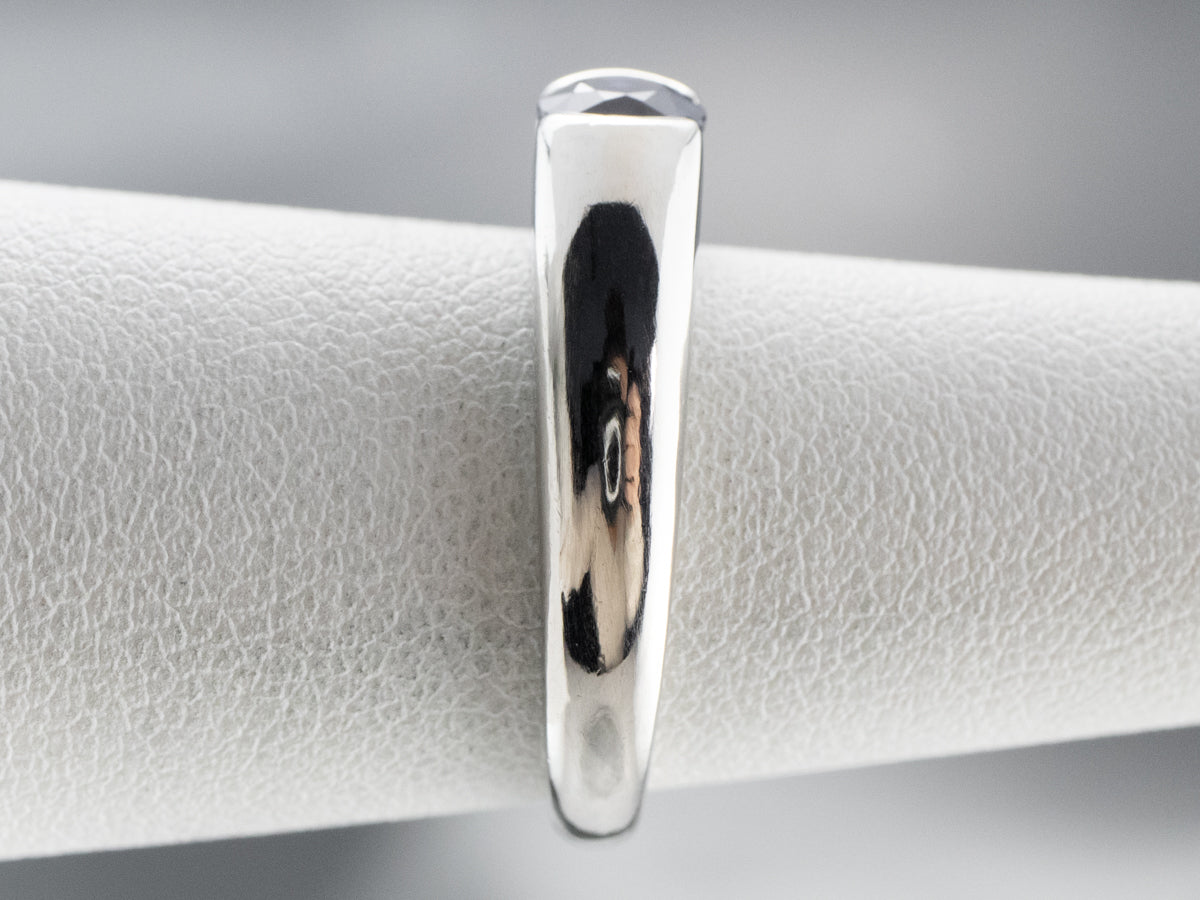 Modern Platinum Sapphire Solitaire Engagement Ring