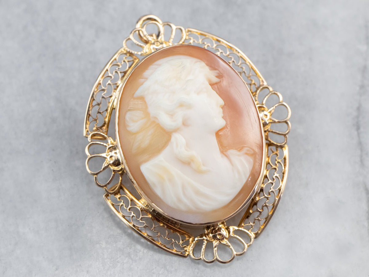 Broche o colgante de cameo de filigrana de oro vintage