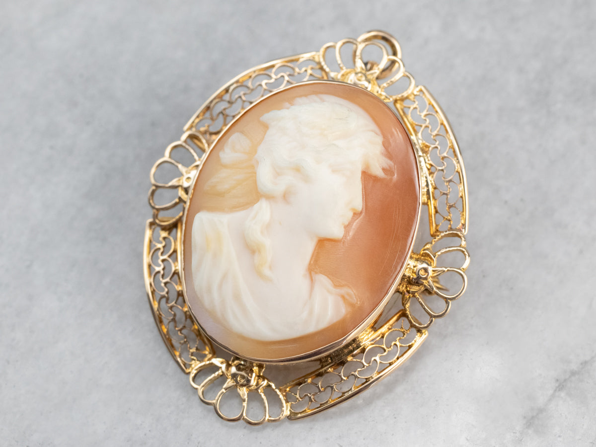 Broche o colgante de cameo de filigrana de oro vintage
